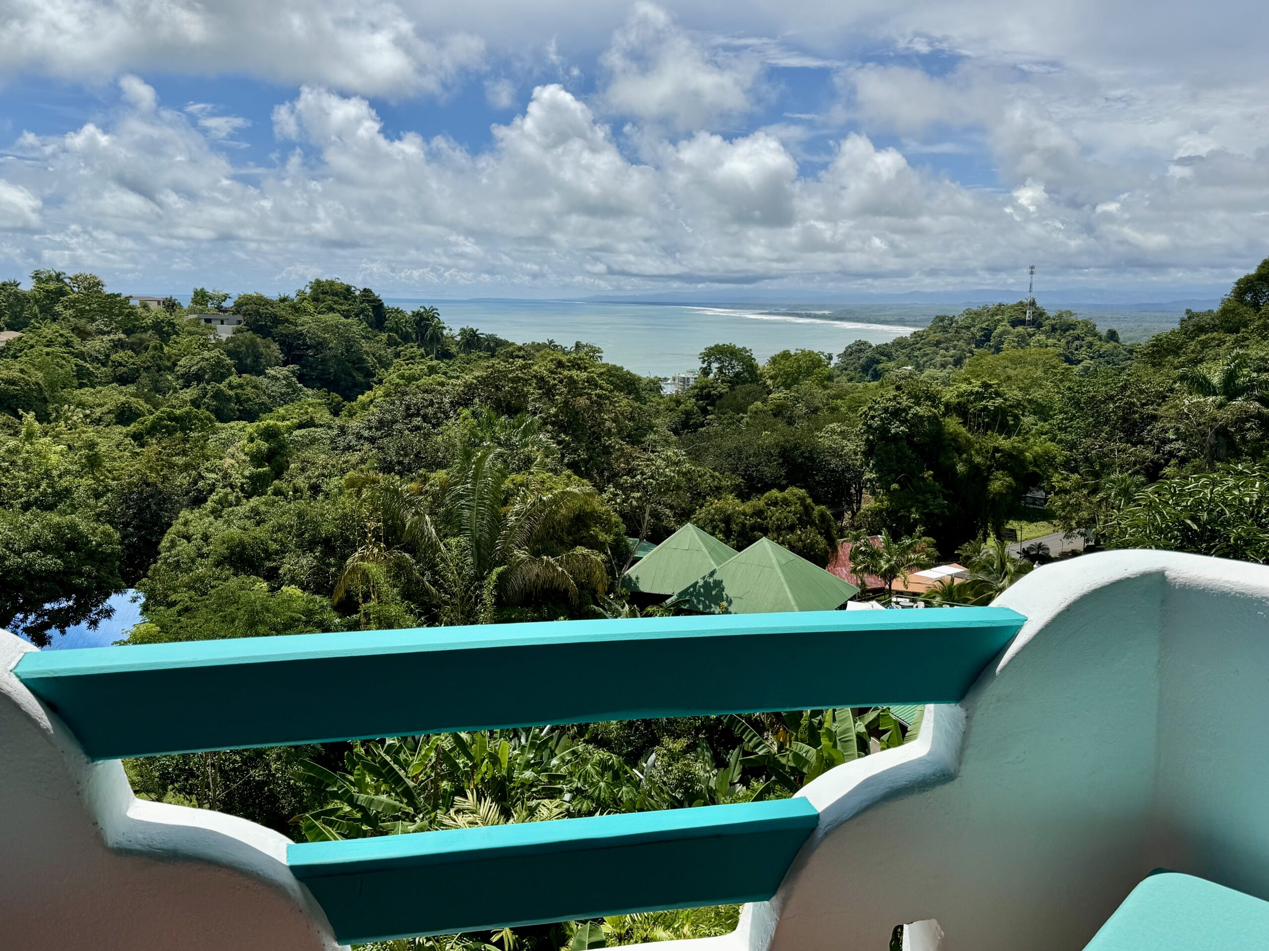 Private balcony overlooking the Pacific Ocean from the Premium Ocean View Room at Planeta Sano Hotel.