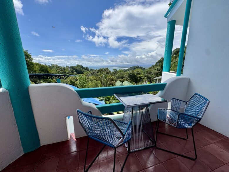 Superior room balcony at Planeta Sano Hotel overlooking jungle and partial ocean